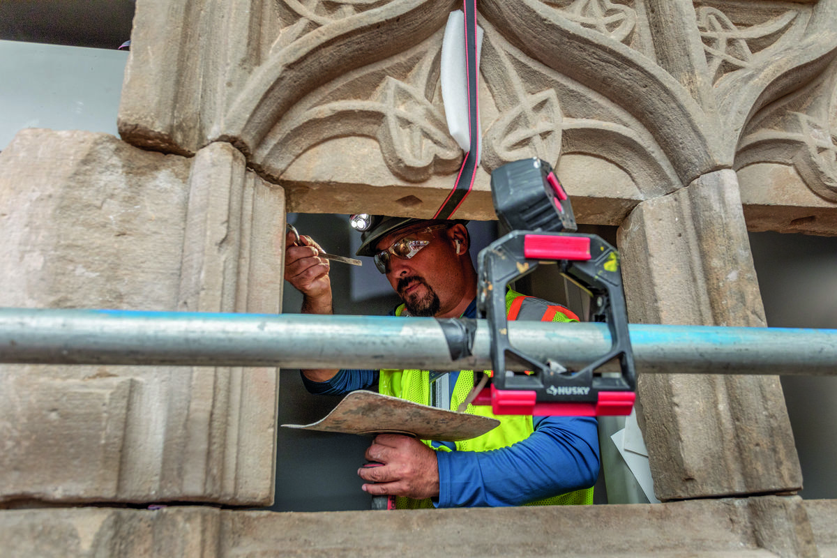 Installation of a 15th century stone window.